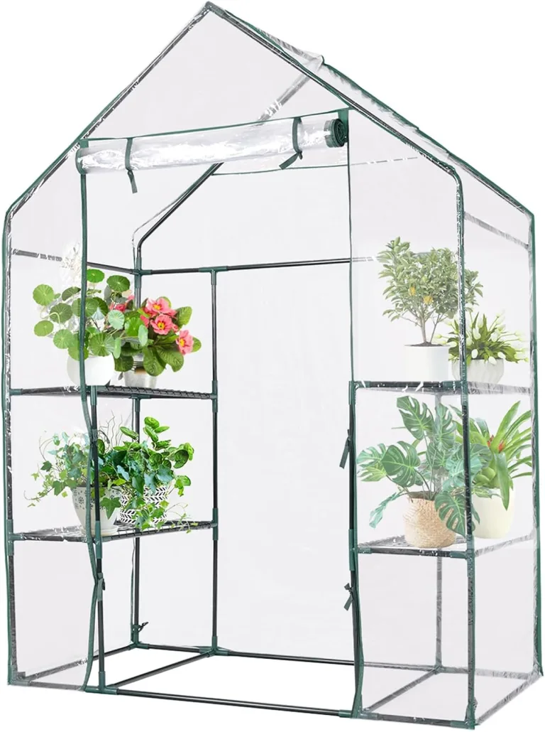 HOMASIS Gewächshaus mit 6 Ablageflächen, transparentes Foliengewächshaus aus PVC, Treibhaus mit Rolltor, Pflanzenhaus mit Metallrahmen, Blumenhaus für Winter, 143 x 73 x 195 cm, Weiß – Bild 1